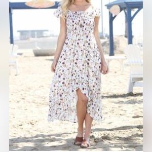 Anada's White Floral Smocked
Flutter- Sleeve 100% Rayon